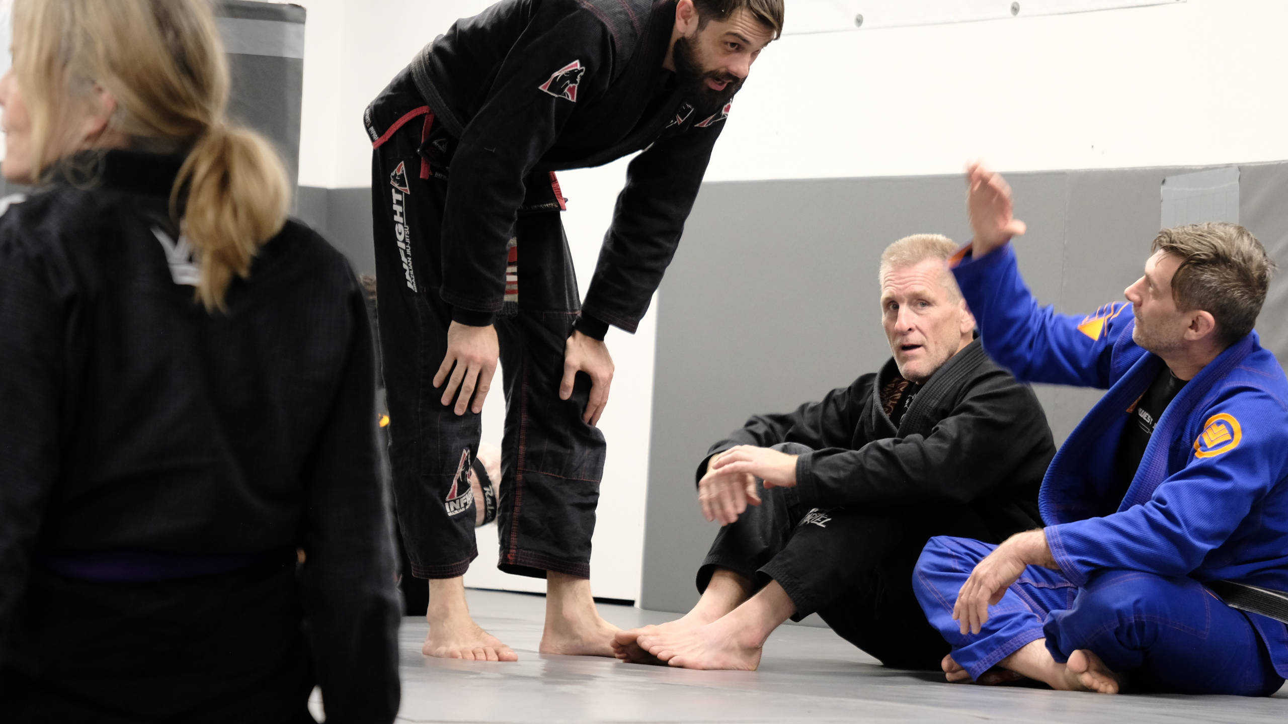 BJJ instructor coaching a small group during class at Budo Vancouver